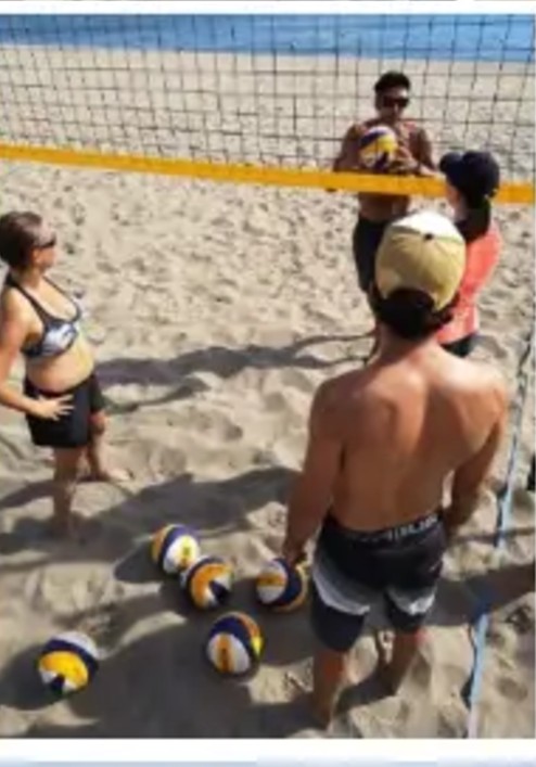Camp-Teilnehmer im Sand